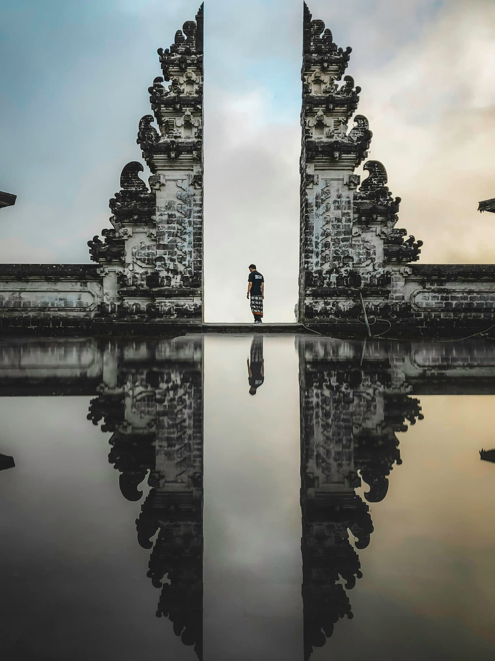 The split gate of Pura Penataran Agung Lempuyang framing Mount Agung at sunrise, East Bali