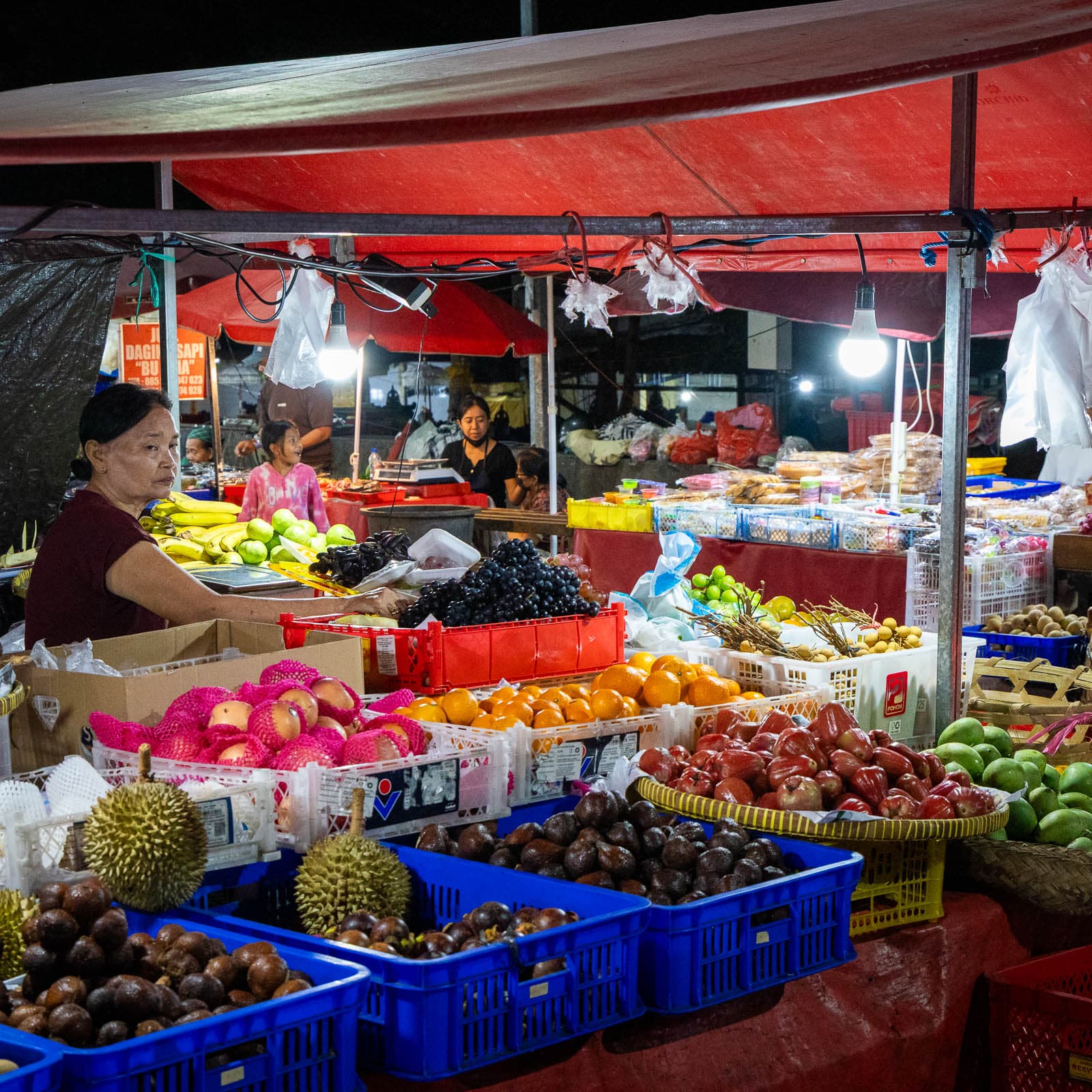 Pasar Badung — the four-storey market building beside the Tukad Badung river