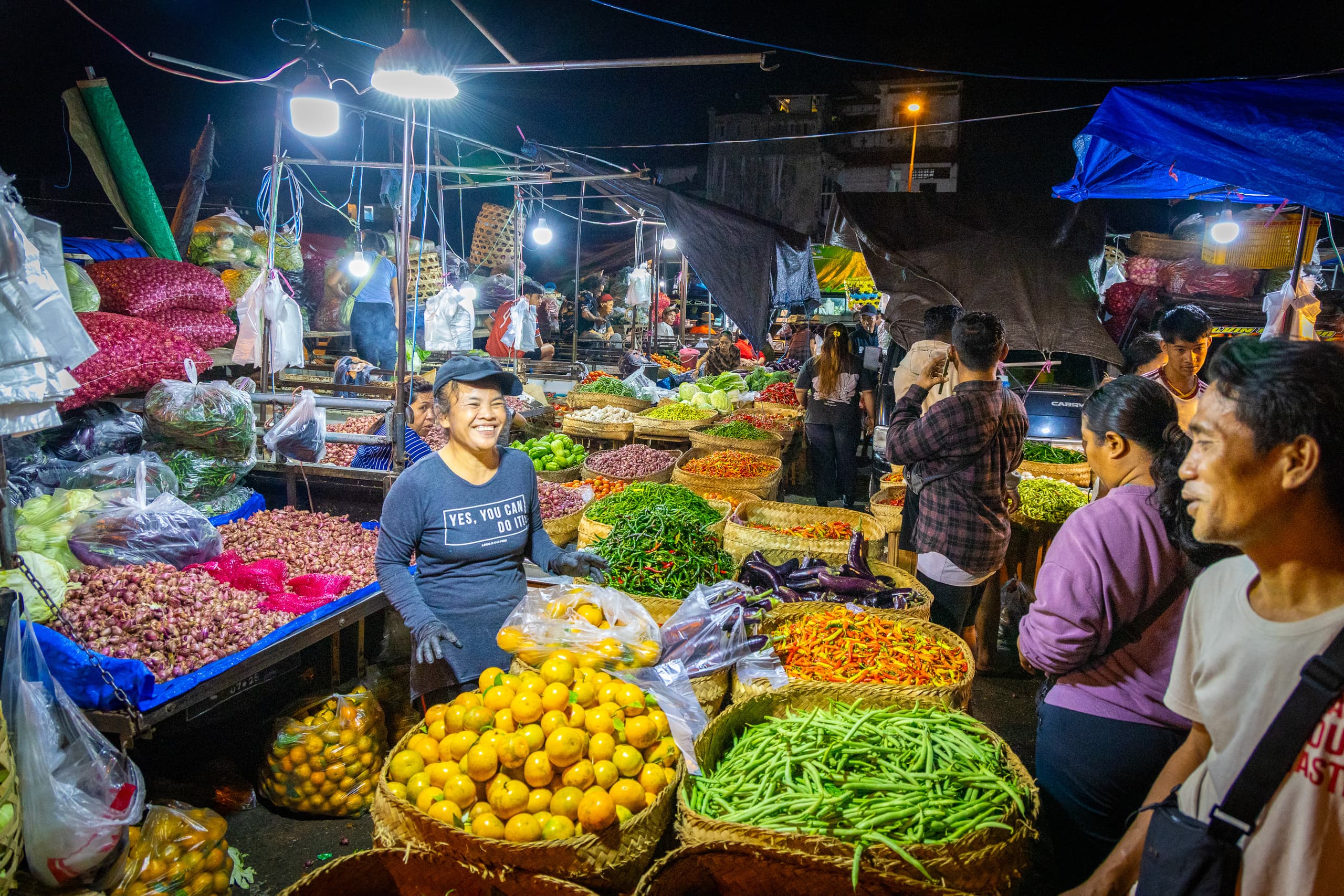 Fruit and vegetable stalls inside Pasar Badung, the four-storey traditional market on the Tukad Badung river in Denpasar, Bali